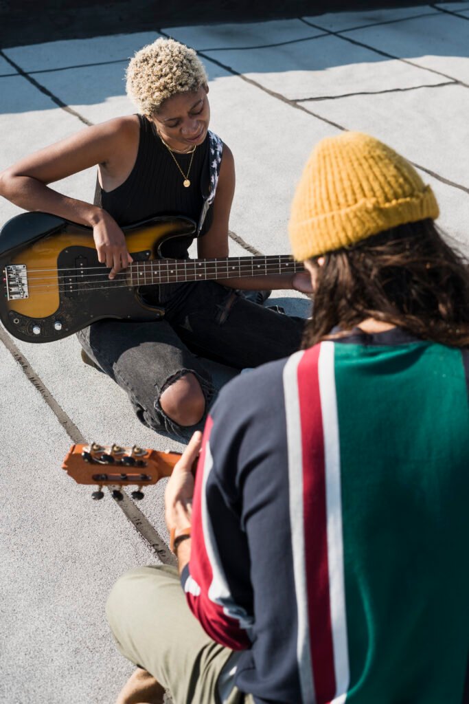 medium shot friends making music